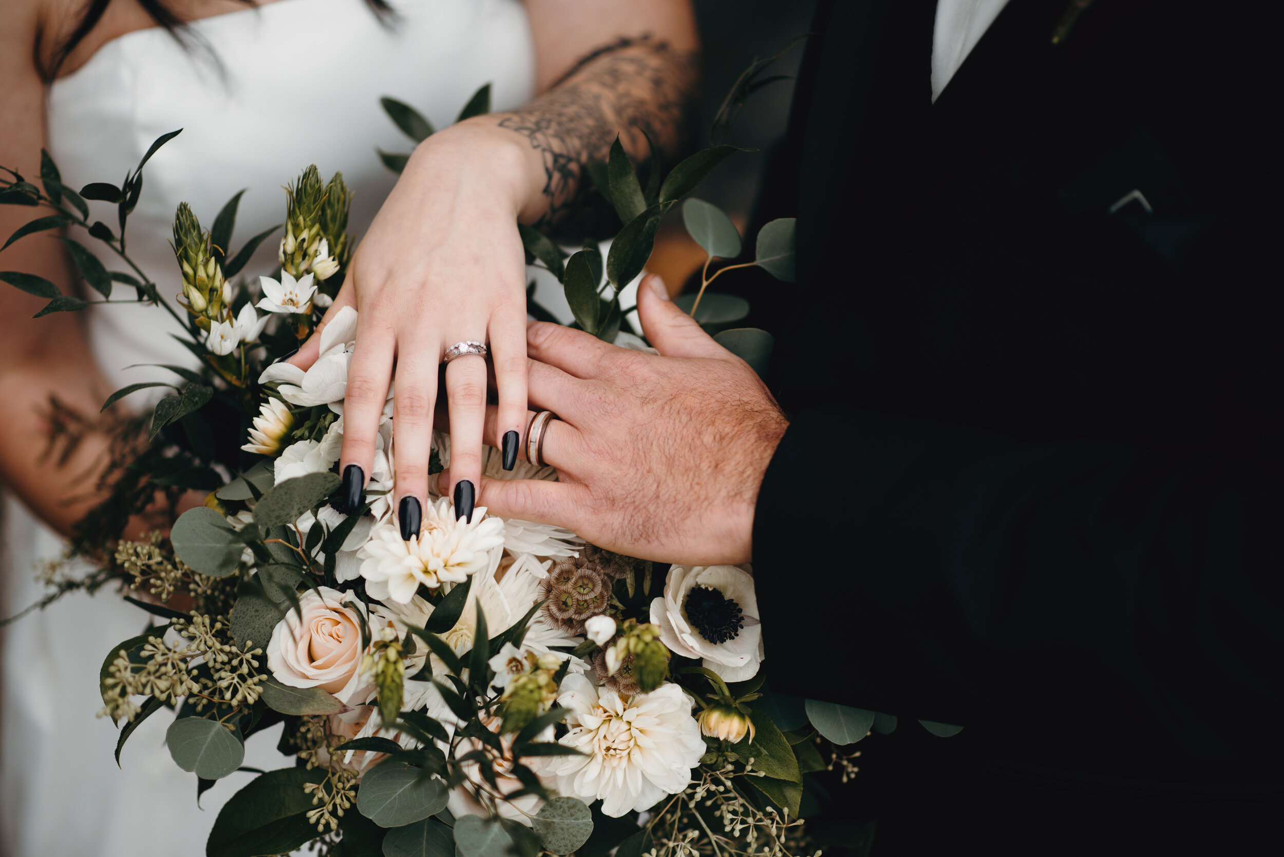 Flowers by Unity Flower Shop. Raegan’s engagement ring: Made from Zach’s grandmother’s.Raegan’s Wedding Band: @diamondfindjewelry on EtsyZach’s Wedding Band: Made by family friend, Chris Kein